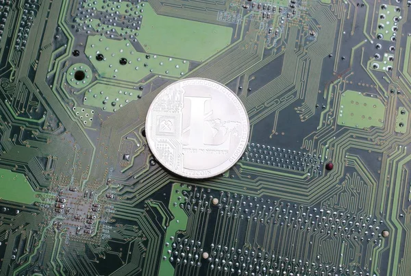 Litecoin digital cryptocurrency physical coin silver computer board