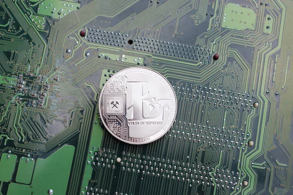 Litecoin digital cryptocurrency physical coin silver computer board