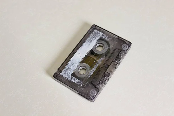 The audio cassette is located on a white background