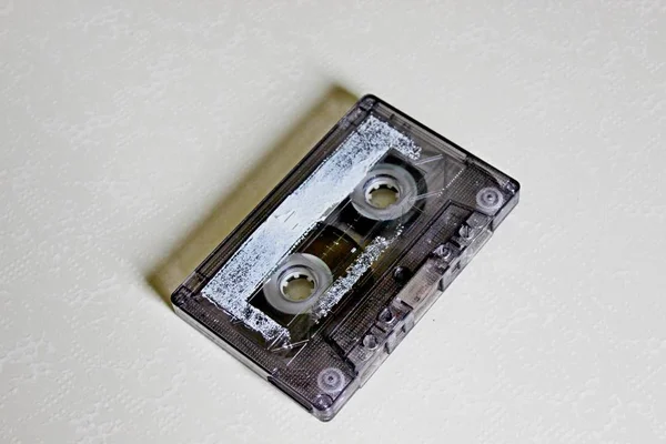 The audio cassette is located on a white background