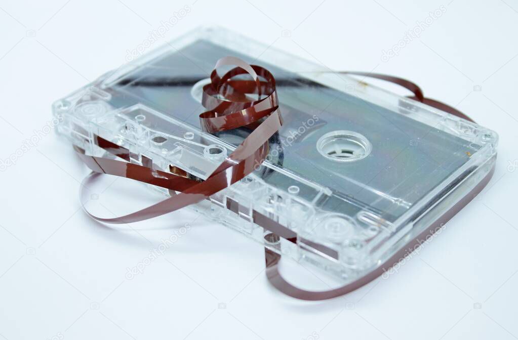 Audio cassette located on a white background