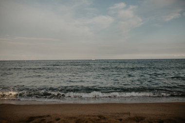 Günbatımı zaman kumsalda arka plan