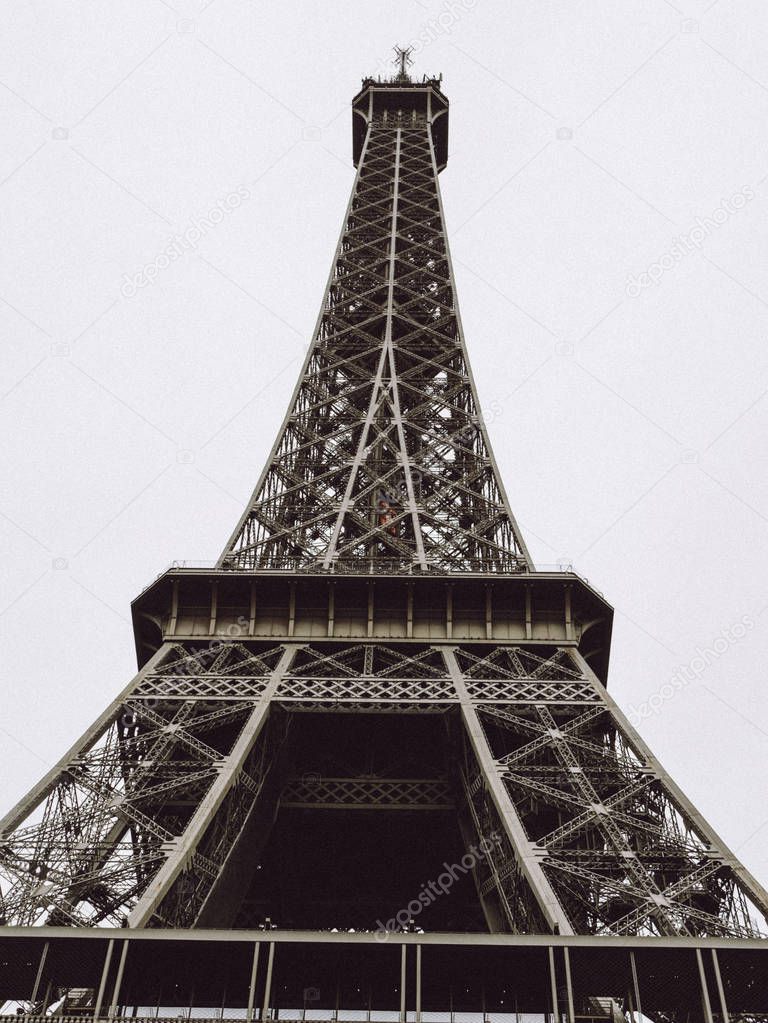 Eiffel tower in Paris on background.