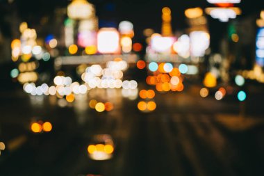 Rating bulanıklık ışık ve şehir arka plan üzerinde renkli bokeh