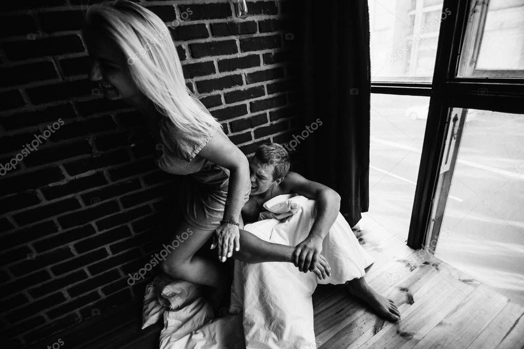 black and white photo of young couple in love 