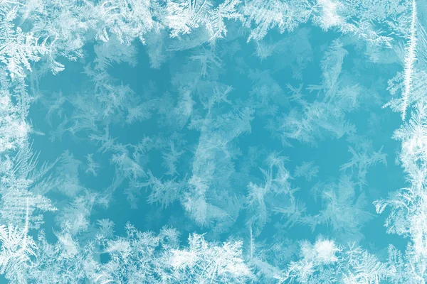 Frost kalıpları donmuş pencere Noel bir simgesi olarak üzerinde merak ediyorum. Noel ve yeni yıl arka plan.