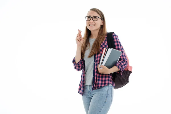 A fehér háttér előtt egy fiatal diák lány portréja Stock Kép
