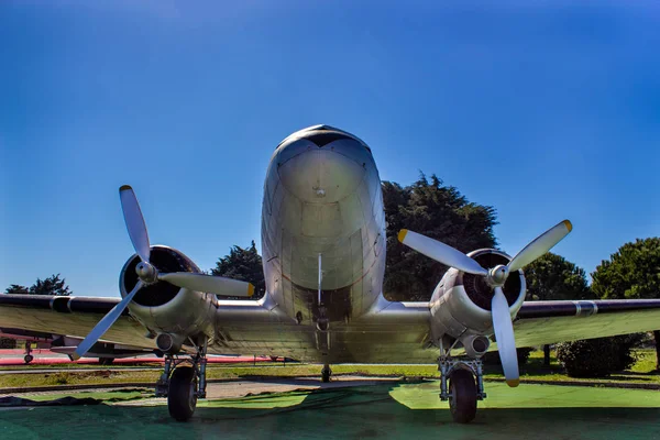 Old military aircraft with blue sky