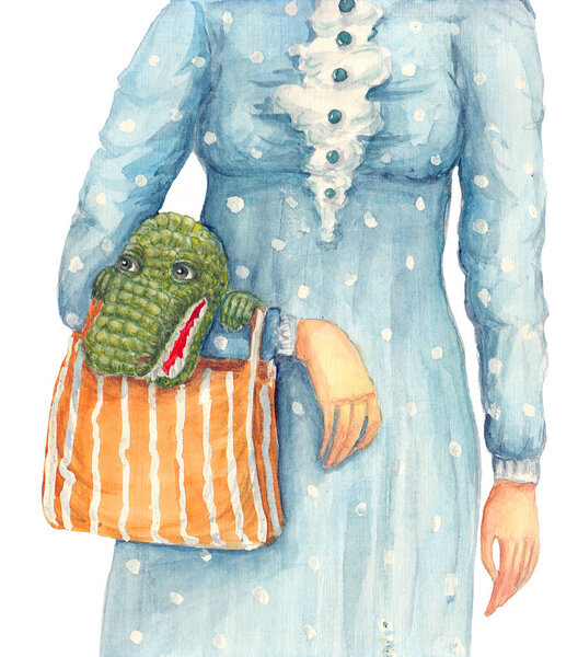 Little crocodile sitting in a handbag of a lady in a blue dress