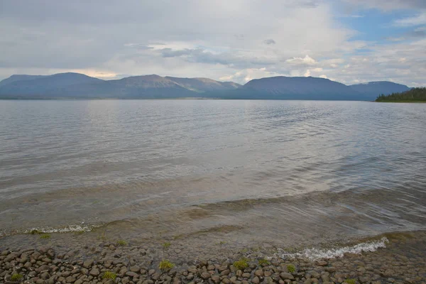 Cloudy lake landscape. — Stock Photo, Image