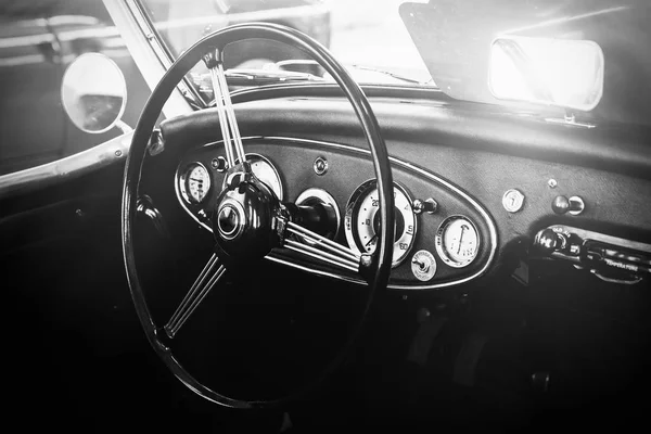 Interior view of classic vintage car. Instagram toning. Beautiful retro car poster, postcard.