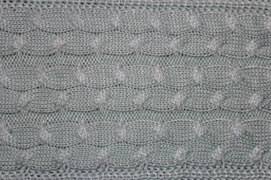  Doku dizeleri ile mavi örme iplik. Desen. Tasarım öğesi