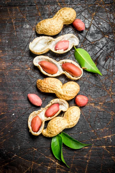 Peanuts with green leaves .