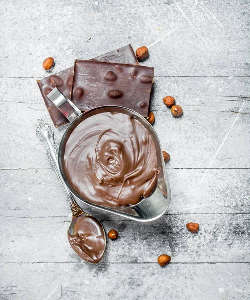 Chocolate paste with nuts.
