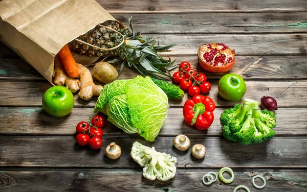 Organic food. Food package with healthy vegetables and fruits.
