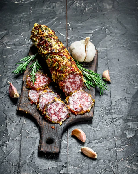Fragrant salami with herbs and spices.
