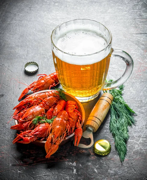 Beer snack. Boiled crayfish with beer and dill.