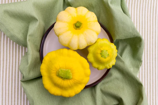 Different sized patty pan summer squash
