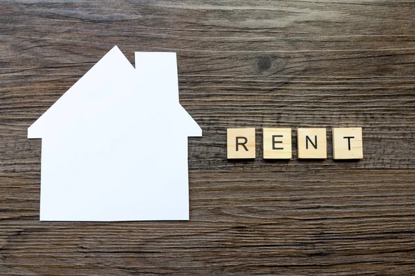 House Renting Concept - Paper house with the word \'Rent\'