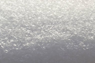 Gri kar arka plan beyaz, yakın çekim