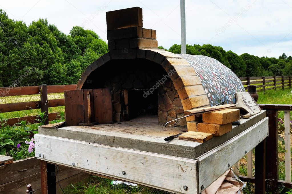 Outdoor brick oven. Pizza oven. Cupola furnace.