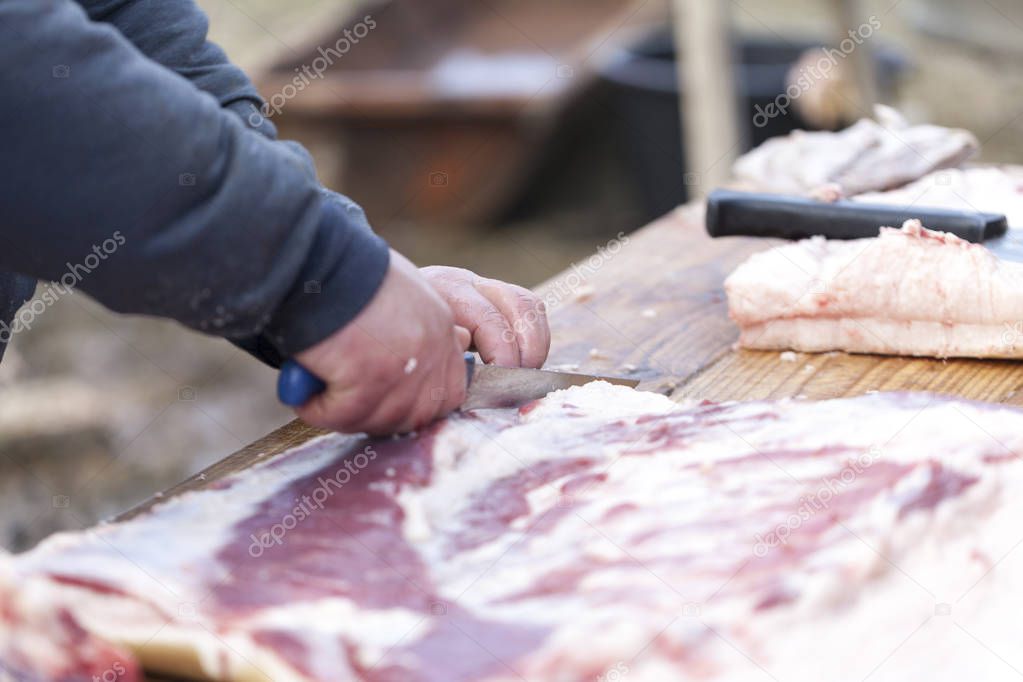 Close cutting of pork meat and preparation for further preparation