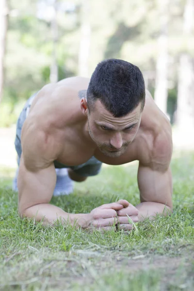 Handsome Young Man Perfectly Prominent Muscles Doing Exercises Park — Stock Photo, Image