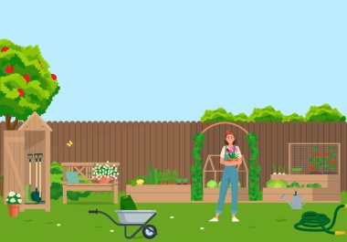 Bahçede sebzeler, çiçekler, bahçe aletleri..