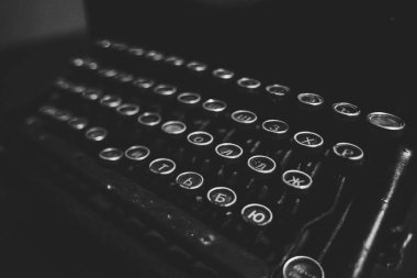 vintage black typewriter with round keys, vintage item clipart