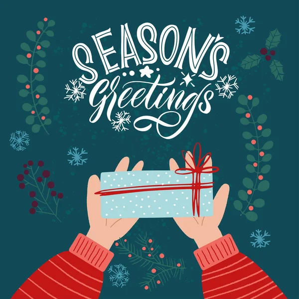 Εποχές χαιρετισμούς. Δώρο στο χέρι. Μεγάλη επιστολόχαρτα για ευχετήριες κάρτες, αυτοκόλλητα, πανό, εκτυπώσεις και διακόσμηση εσωτερικών χώρων. Χριστουγεννιάτικη κάρτα. Καλά Χριστούγεννα και Ευτυχισμένο το νέο έτος 2021. — Διανυσματικό Αρχείο