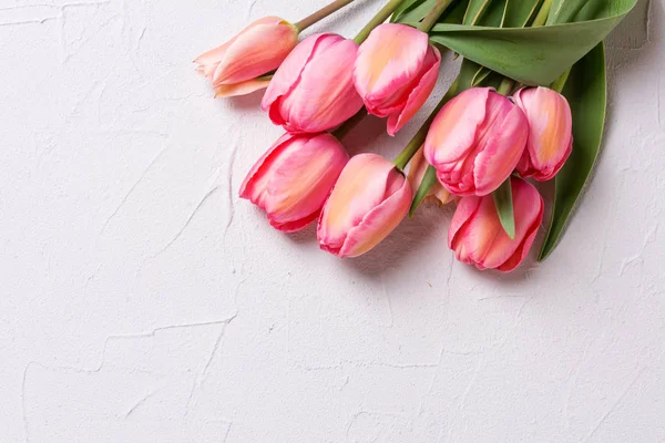 Rahmen Aus Rosa Tulpenblüten Auf Strukturiertem Hintergrund Blumenstillleben Selektiver Fokus — Stockfoto