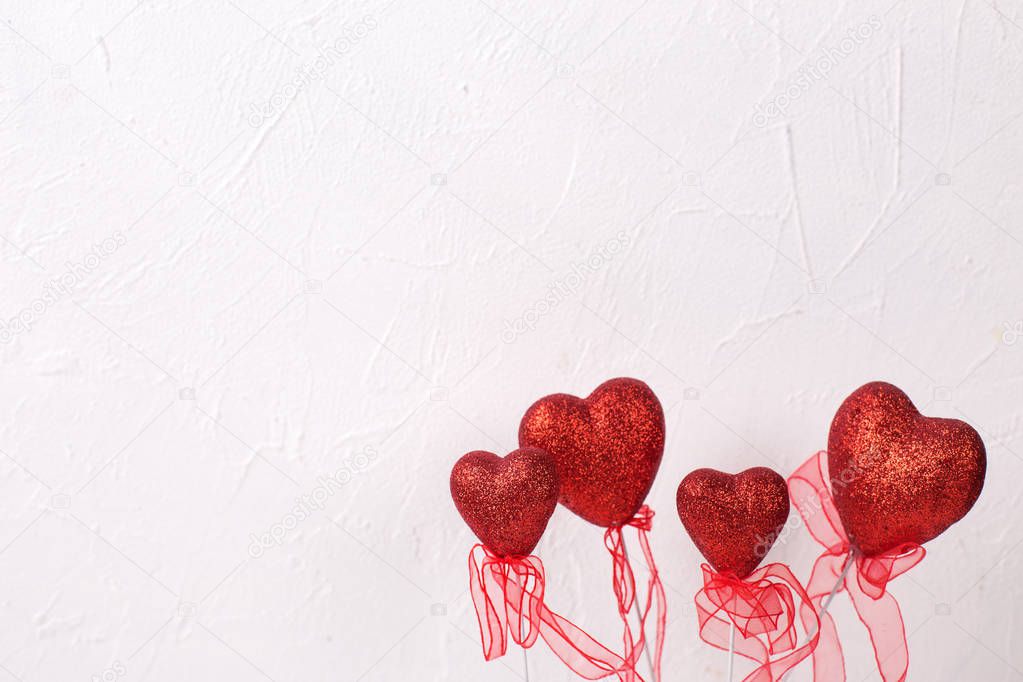 St Valentine Day background, red hearts against white background