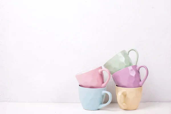 Close View Pile Colourful Teacups White Background — Stock Photo, Image