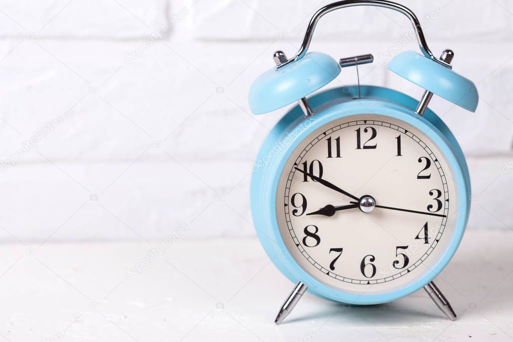 Blue rounde alarm clock