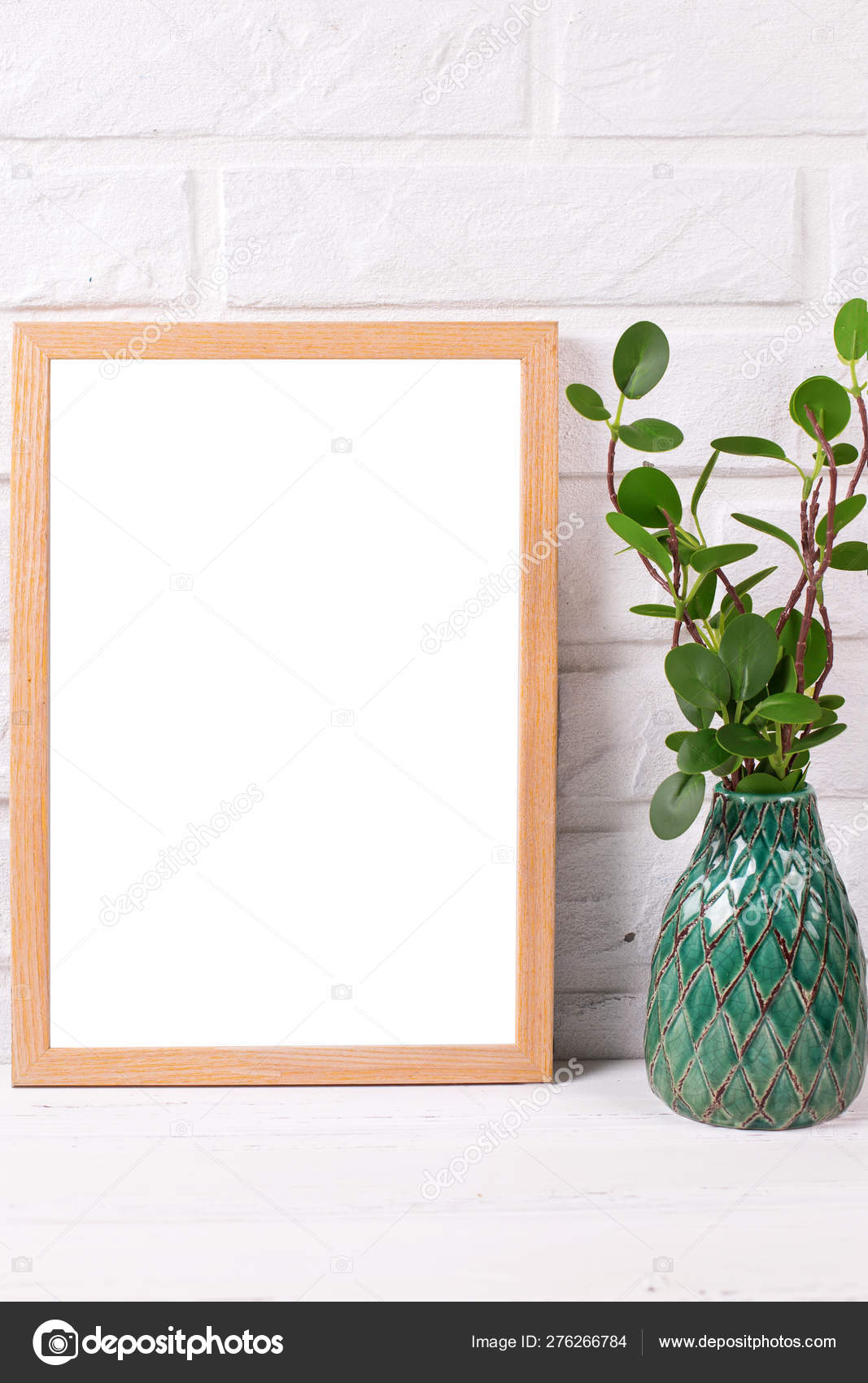 Download Empty Wooden Frame Mockup With Copy Space And Plant In Green Va Stock Photo C Daffodil 276266784 PSD Mockup Templates
