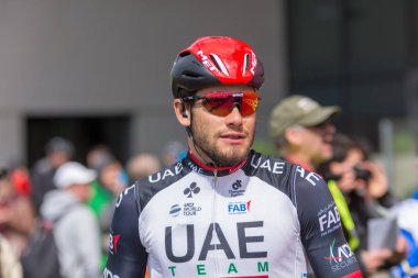 ESCHBORN, GERMANY - MAY 1st 2018: Filippo Ganna (UAE Team Emirates) at Eschborn-Frankfurt cycling race clipart