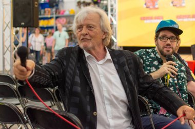 FRANKFURT, GERMANY - MAY 6th 2018: Rutger Hauer (*1944, actor, Blade Runner, The Hitcher, Nighthawks) at German Comic Con Frankfurt, a two day fan convention clipart