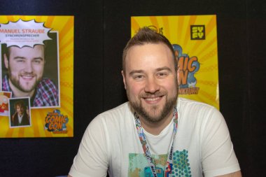 FRANKFURT, GERMANY - MAY 6th 2018: Manuel Straube (*1984, voice actor, german voice of Martin Freeman, Stewie Griffin, Jason Earles) at German Comic Con Frankfurt, a two day fan convention clipart