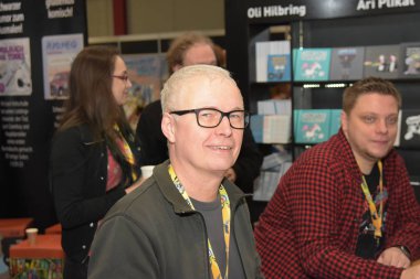 Dortmund, Almanya - 9th Aralık 2017: Alman karikatürist Ari Plikat (* 1958 - Titanic, Eulenspiegel, Zitty, AF, taz, Stern) adlı Alman Comic Con Dortmund.