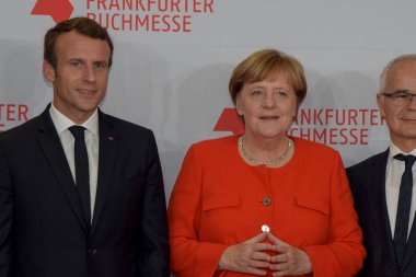 Frankfurt, Almanya. 10 Ekim, 2017. Fransız Başkan Emmanuel Macron ve Alman şansölye Angela Merkel, Frankfurt Bookfair / Buchmesse Frankfurt 2017 Açılış töreni
