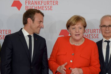 Frankfurt, Almanya. 10 Ekim, 2017. Fransız Başkan Emmanuel Macron ve Alman şansölye Angela Merkel, Frankfurt Bookfair / Buchmesse Frankfurt 2017 Açılış töreni