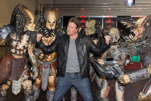 DORTMUND, GERMANY - APRIL 8: Actor Lochlyn Munro (Freddy vs. Jason, Scary Movie, Charmed, Riverdale) surrounded by predators at Weekend of Hell, a two day (April 7-8 2018) horror-themed fan convention.