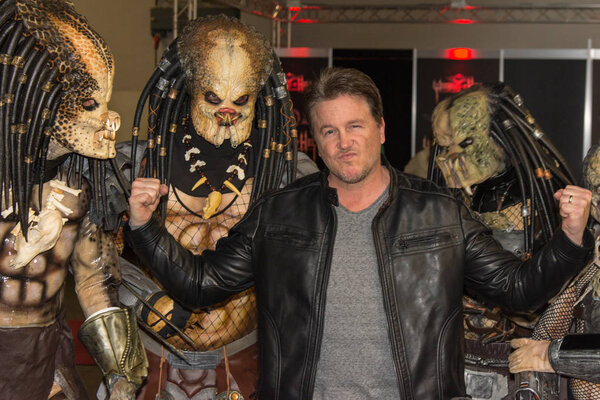 DORTMUND, GERMANY - APRIL 8: Actor Lochlyn Munro (Freddy vs. Jason, Scary Movie, Charmed, Riverdale) surrounded by predators at Weekend of Hell, a two day (April 7-8 2018) horror-themed fan convention.