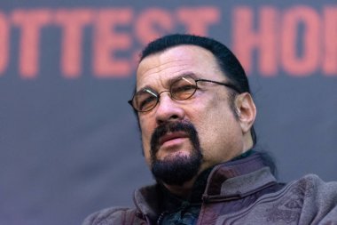 DORTMUND, GERMANY - November 3rd 2018: Steven Seagal (*1952, American actor, martial artist, and film producer - Red Alert, Nico, Deadly Revenge) at Weekend of Hell 2018 clipart