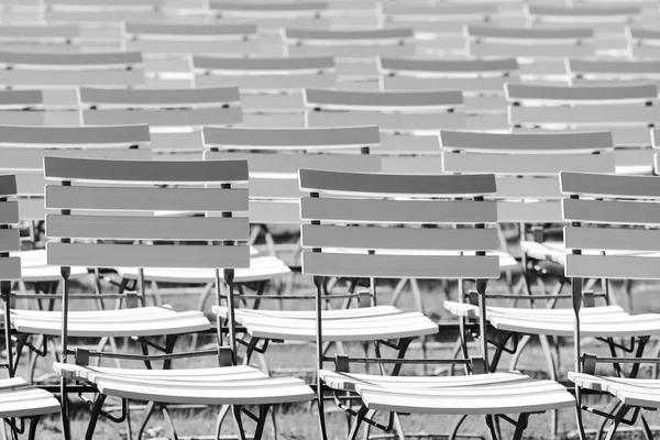 White chair rows in a spa park in Black & White medium light