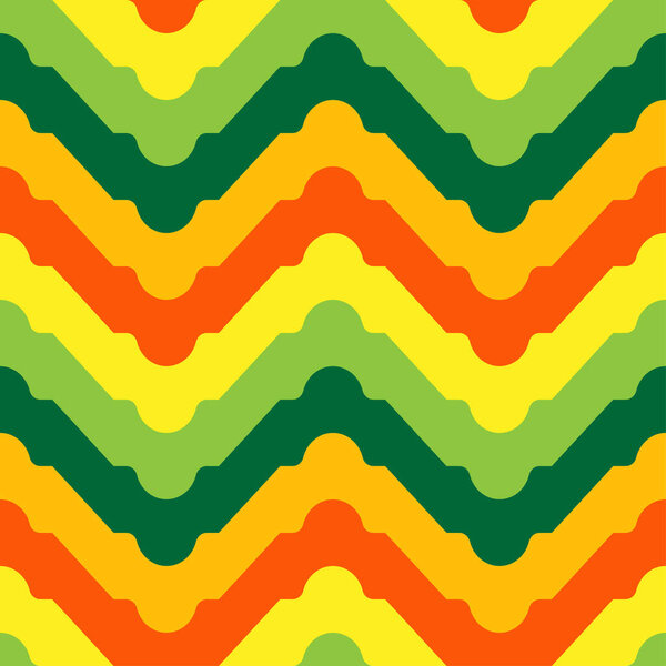 Vintage zig-zag tribal pattern in orange, yellow and green. Vector seamless pattern design for textile, fashion, paper and wrapping.