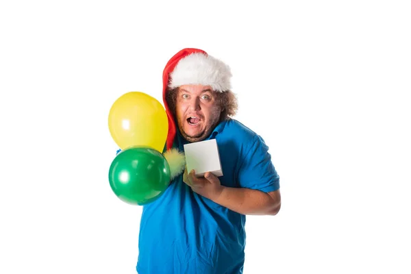 Lustige Dicke Mann Mit Weihnachtsmütze Mit Luftballons Und Geschenke Weihnachten — Stockfoto