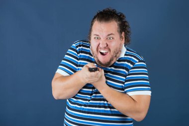 Spor fan bir televizyon uzaktan kumanda ile. Kazan ya da kaybet