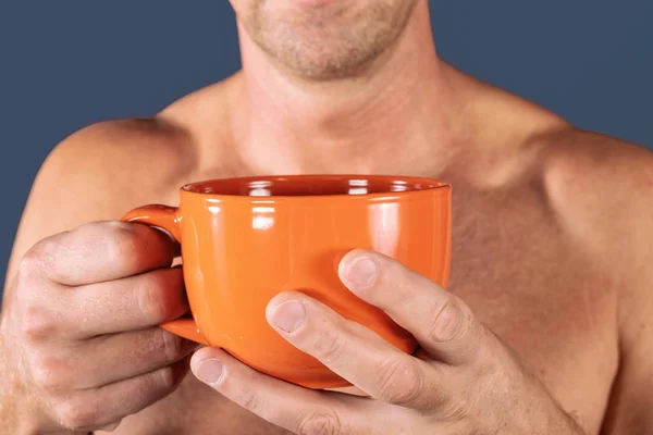 Close Hand Man Holding Orange Coffee Cup — Stock Photo, Image