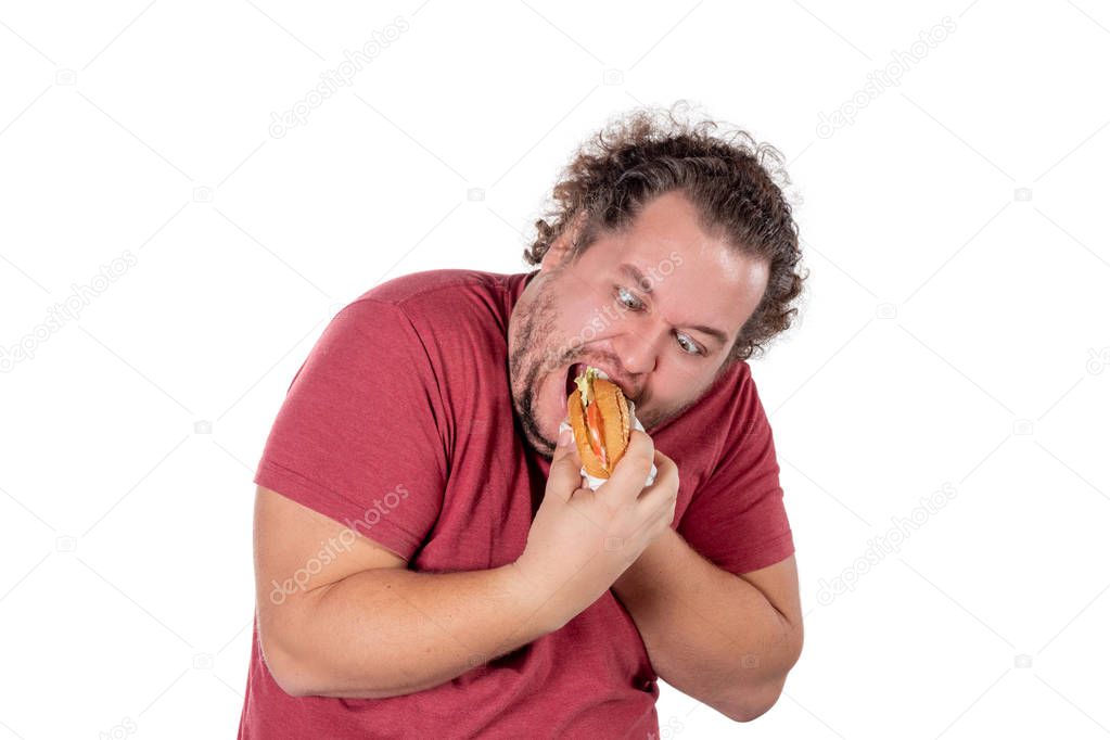 Funny fat man eating hamburger. Fast food, unhealty eat